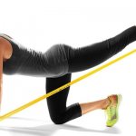 Abdominal exercises with an elastic band for fitness at home